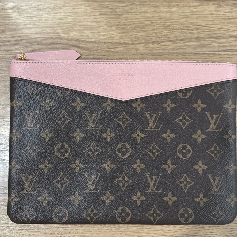 Never used Louis Vuitton Daily Pouch